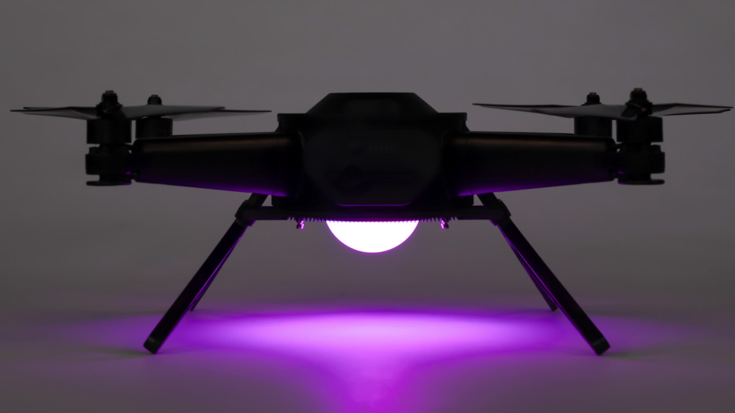 X7 drone glowing with purple light